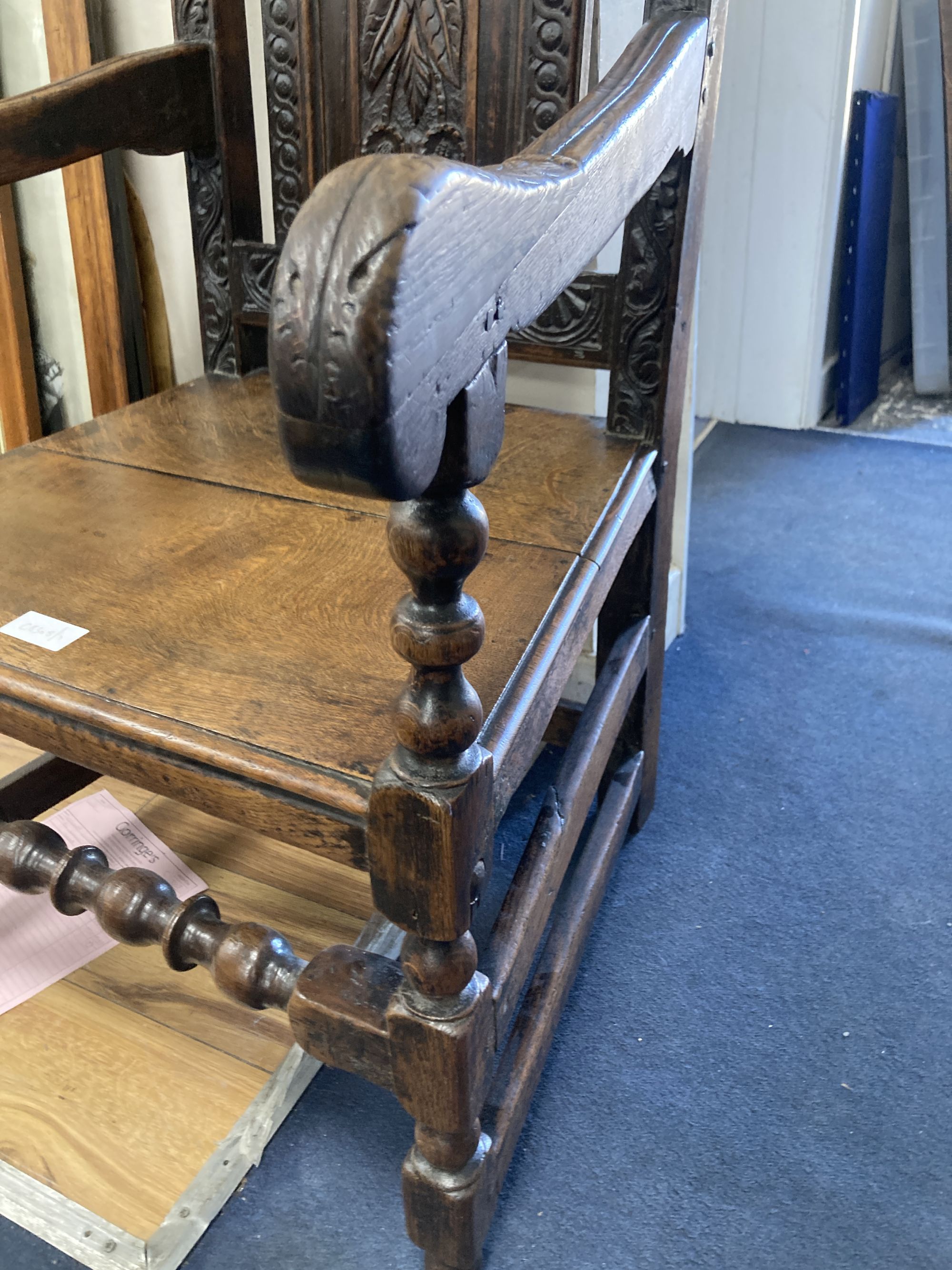 A 19th century oak Wainscot chair, width 64cm depth 49cm height 110cm